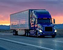 Certified car transport truck carrying vehicles from Michigan to Texas during relocation